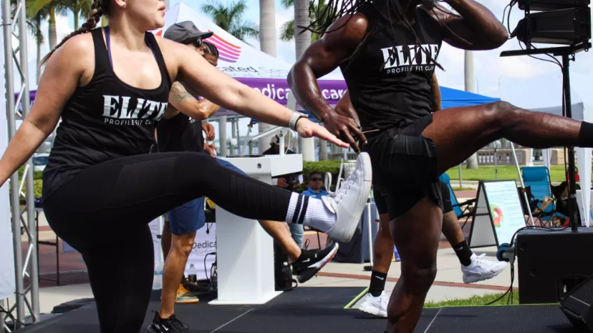 Coaches leading a HIIT workout