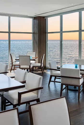 The sunset dining room view from JWB Grill at Margraritaville Beach Resort on Fort Myers Beach