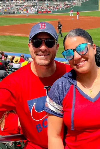 A couple enjoy a Red Sox spring training game.