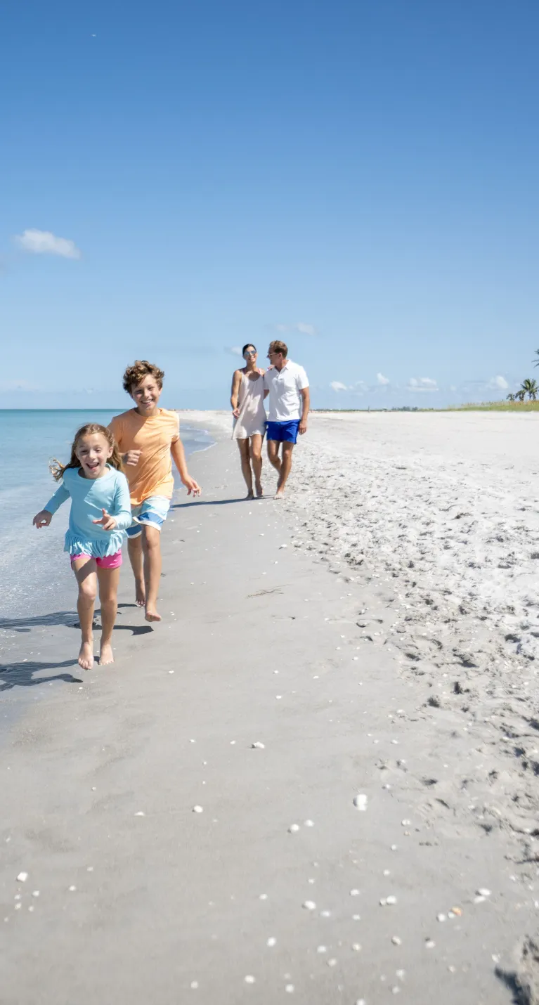 Family playing on beach