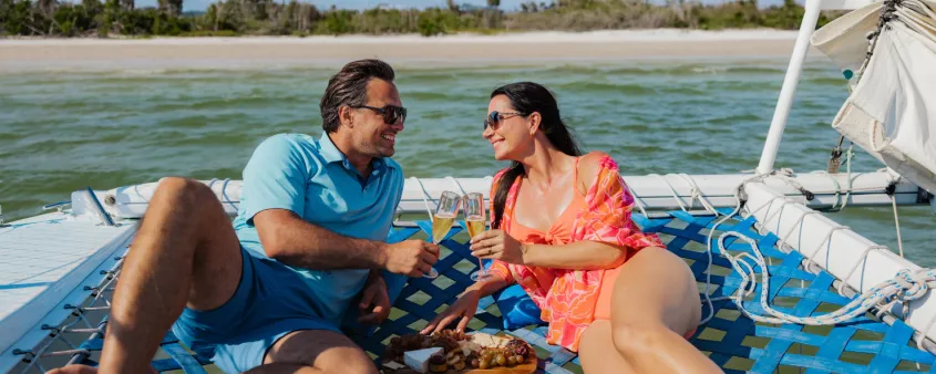 A couple enjoys a sailing trip 